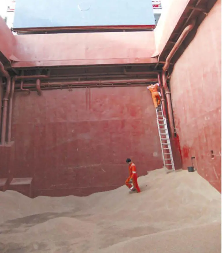 Access to ventilation holes in cargo holds is often difficult – in this case, the ventilator opening is behind the pipes under the deck (Gard)