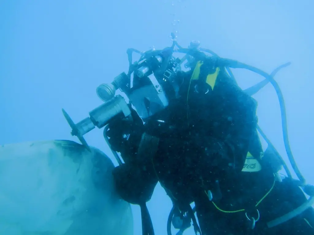 A Hydrex diver repairs a damaged propeller blade