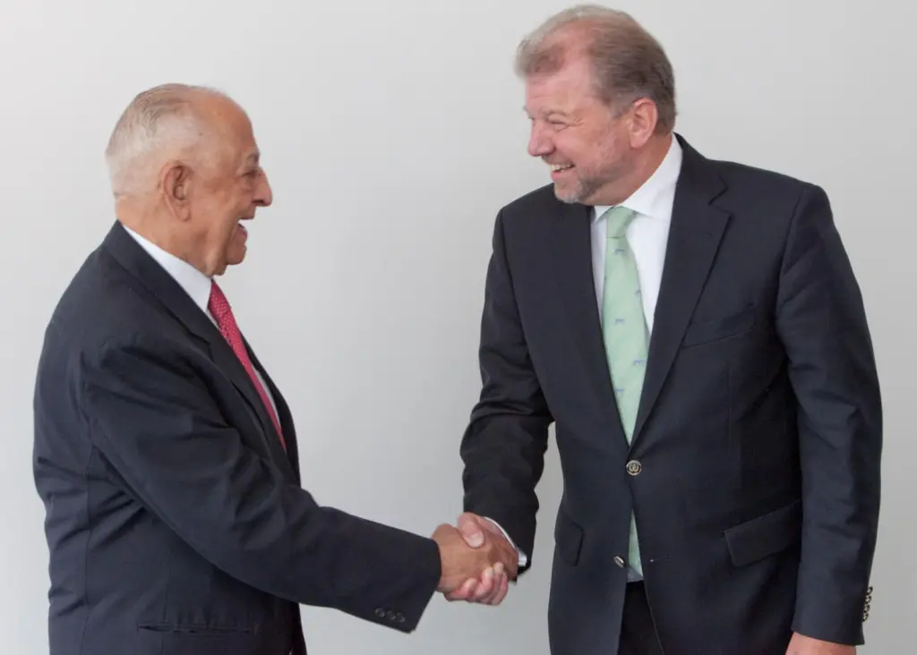 Dr Hermann J. Klein, IACS chairman (right), is obviously very happy to welcome IRS and its chairman, Captain J.C. Anand, to IACS