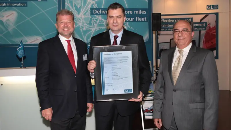Dr Hermann Klein of GL (left) presents Costamare Shipping with its first MLC 2006 certification