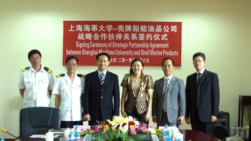 From left to right, Zhou Shen-Bo, secretary of party general branch of merchant marine college, Shanghai Maritime University, Shi Chao-Jian, professor and dean of merchant marine college, Shanghai Maritime University, Jin Yong-Xing, professor an...
