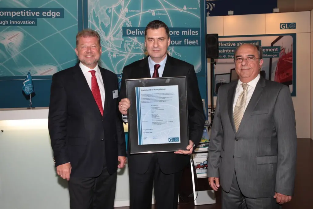 Dr Hermann Klein of GL (left) presents Costamare Shipping with its first MLC 2006 certification