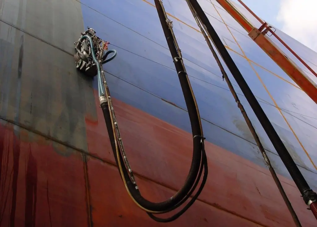 The Envirobot ultra high pressure hull blasting system in action at Gibdock