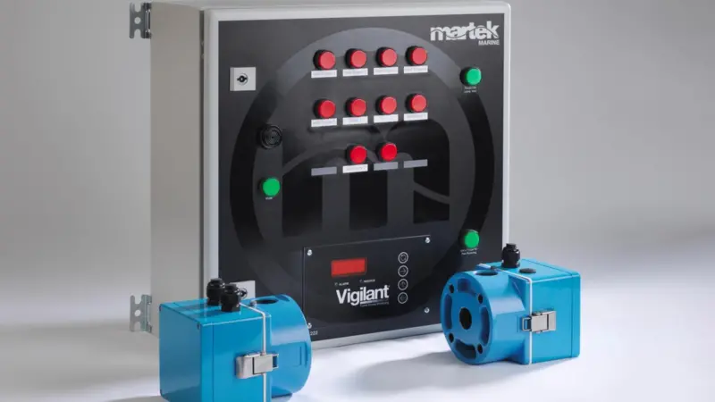 A Vigilant funnel smoke monitoring system control panel with transmitter and receiver