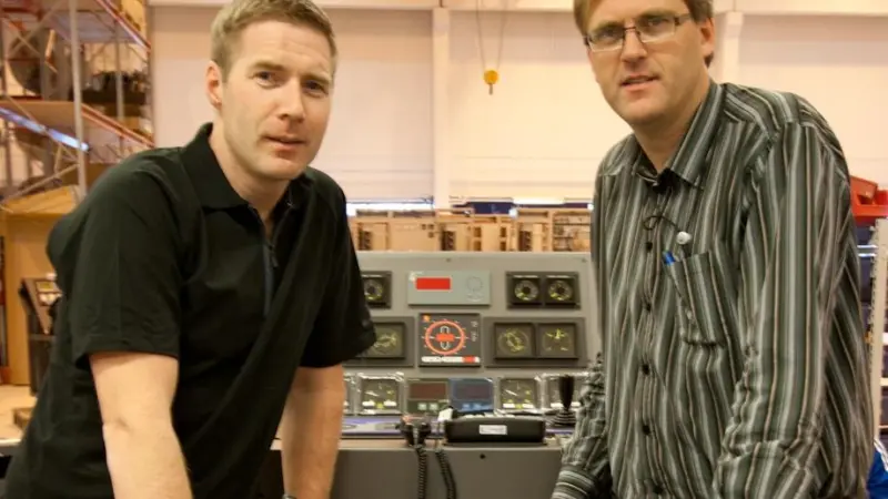 Arne Ove Rødstøl and Gunnar H. Hide at UPC with a modular bridge console under production