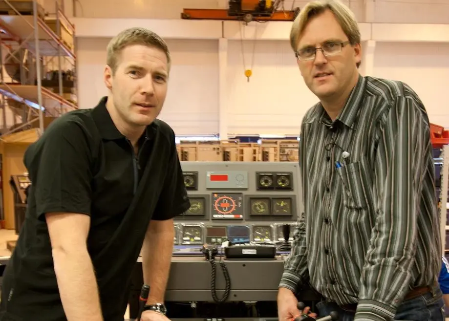 Arne Ove Rødstøl and Gunnar H. Hide at UPC with a modular bridge console under production