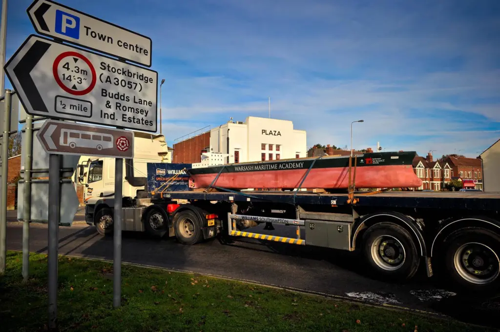 One of the 9m shiphandling training models in transit to its new base