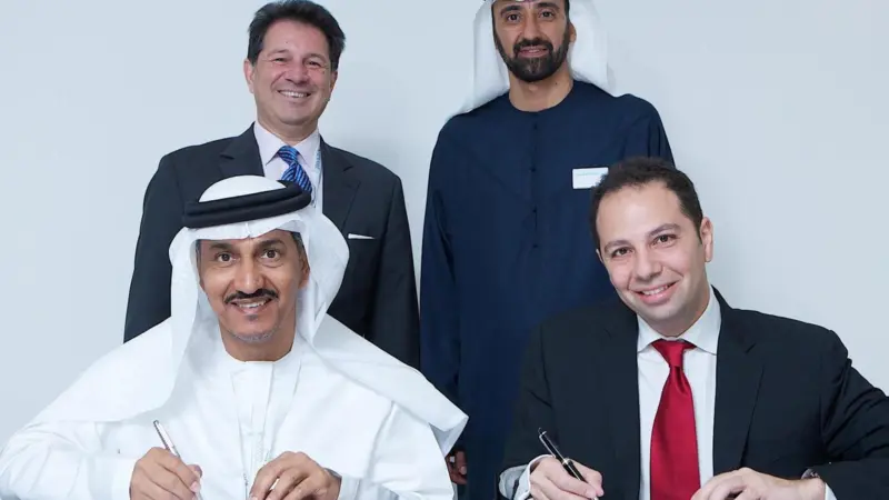 Signing to MoU: back row (left to right): Tarek Ragheb, chairman De Birs, Homaid Al Shemmari, chairman, ADSB; front row (left to right): Mohamed Salem Al Junaibi, CEO, ADSB & Rady W. Fahmy, senior director and board member, DeBirs