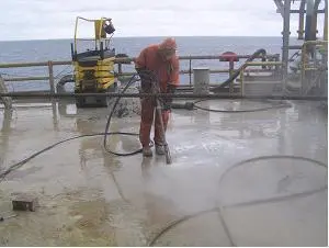 UHP water-jetting equipment in use for deck maintenance