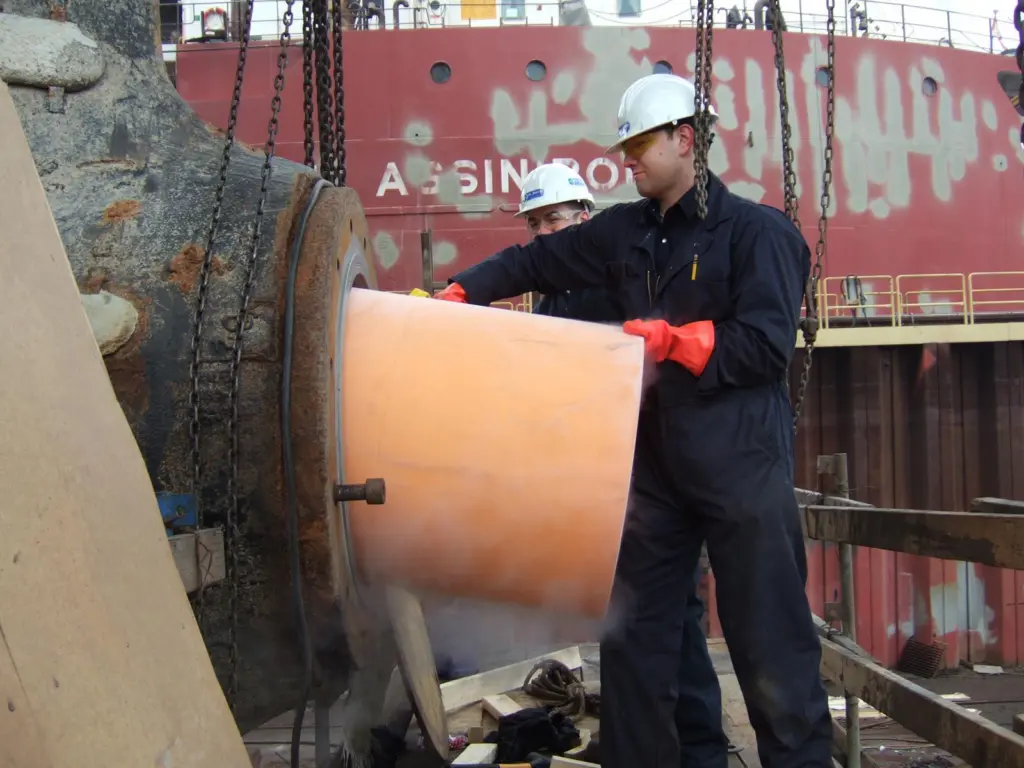 Installing Thordon's seawater lubricated propeller shaft bearing replacing metal bearing and oil