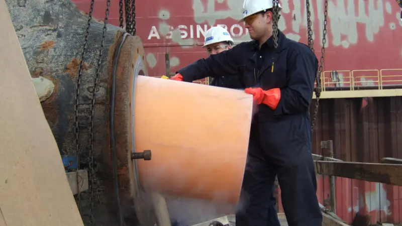 Installing Thordon's seawater lubricated propeller shaft bearing replacing metal bearing and oil