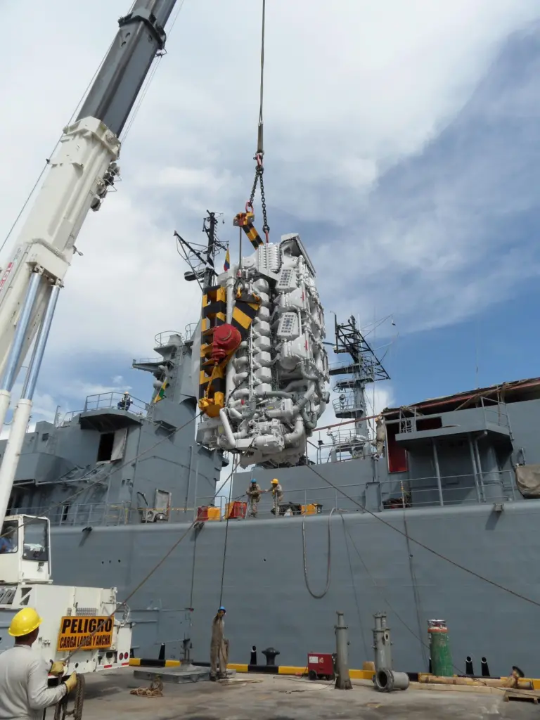 One of the new MTU 1163 TB 73L is craned onboard a Colombian navy frigate