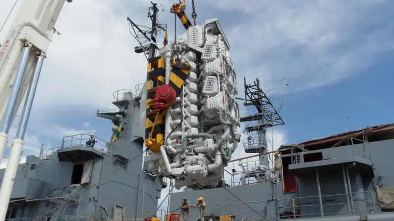 One of the new MTU 1163 TB 73L is craned onboard a Colombian navy frigate