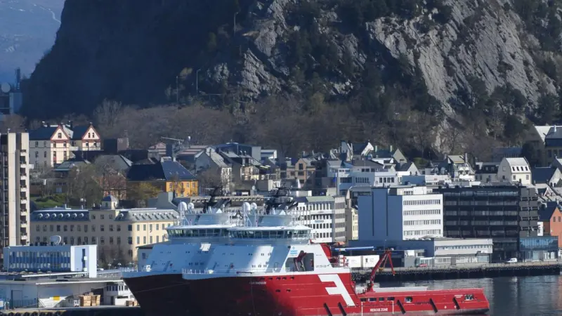Two Farstad Shipping vessels in typical Norway West Coast surroundings