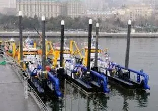 Cutter suction dredgers alongside quay in Baku