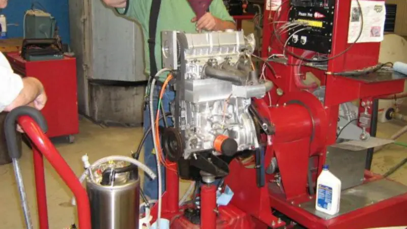 A small Suzuki engine has been converted to detonate vaporised / gaseous fuels, by elongating the cylinder to hold a harmonic oscillator which sets explosions; fuel supply was limited to prevent bursting but 40% higher power output was still ach...