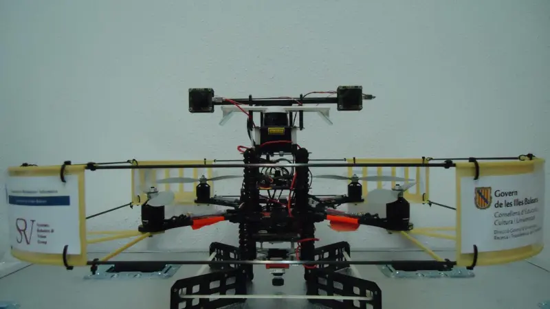 A small, remote-controlled, four-rotor helicopter is able to carry out overall surveys within cargo holds