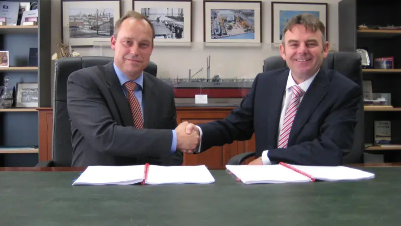 Western Ferries’ managing director, Gordon Ross signs the contract with Cammell Laird’s chief executive, John Syvret