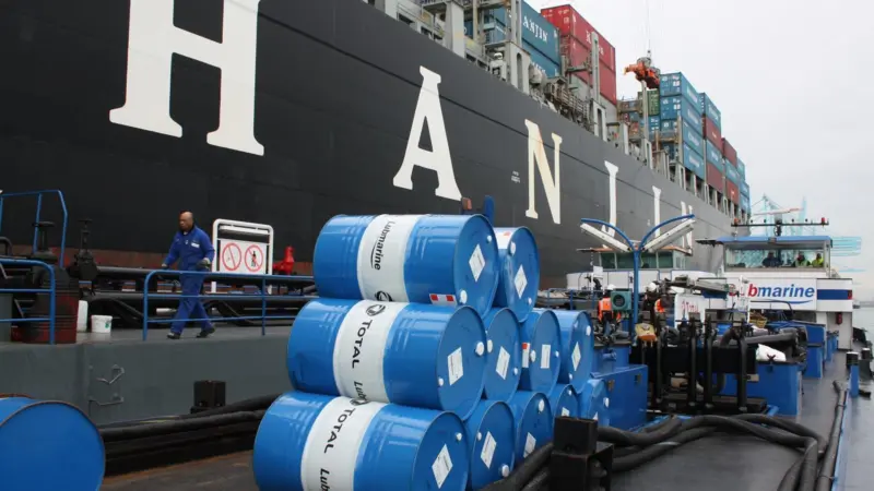 Lubmarine barrels on barge