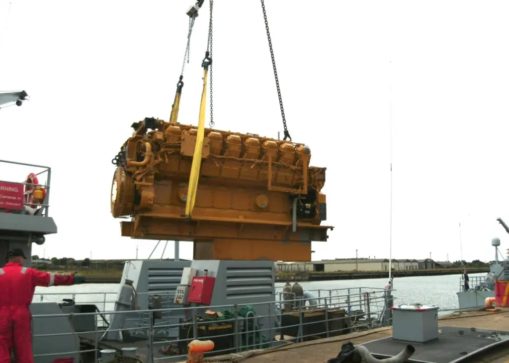 Finning cranes off a Caterpillar engine from a HM Border Force patrol craft