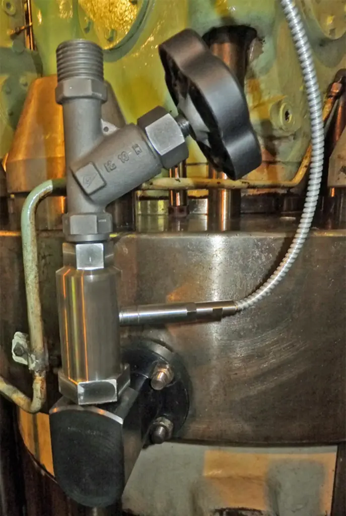 The IMES TCS-01CA cylinder pressure sensor mounted on an engine