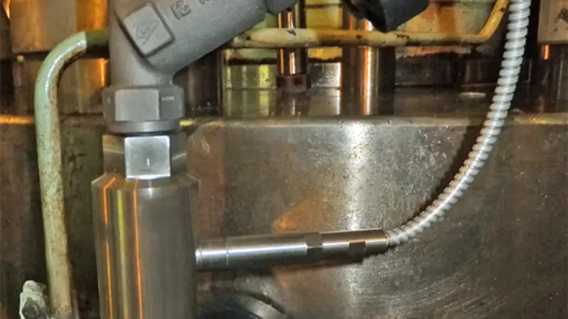The IMES TCS-01CA cylinder pressure sensor mounted on an engine