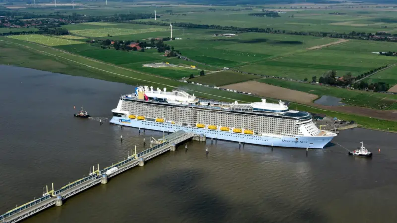 Navigational skill completes an industrial feat: Quantum of the Seas on her passage down the Ems from the builder's yard at Papenburg