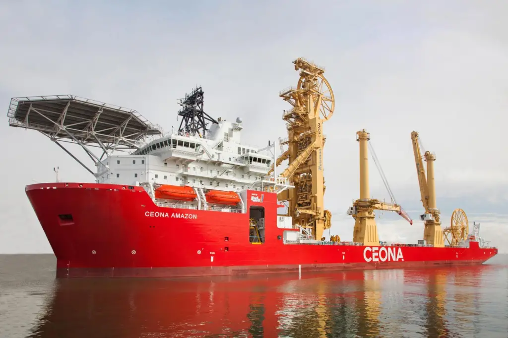 Pipelaying tower and two 400te offshore cranes rise above the deck of the deepwater field development vessel Ceona Amazon. Courtesy of Ceona (copyright Kloet)