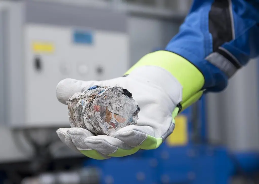 Evac's machine forms dry briquettes that can be stored for landing or incinerated at sea