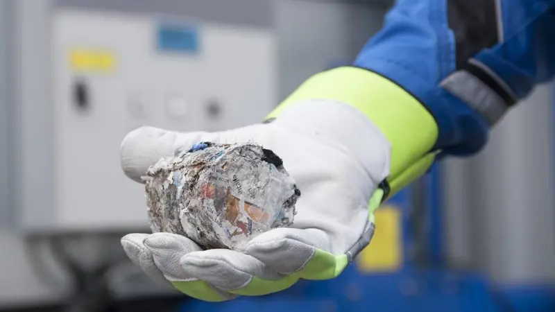 Evac's machine forms dry briquettes that can be stored for landing or incinerated at sea