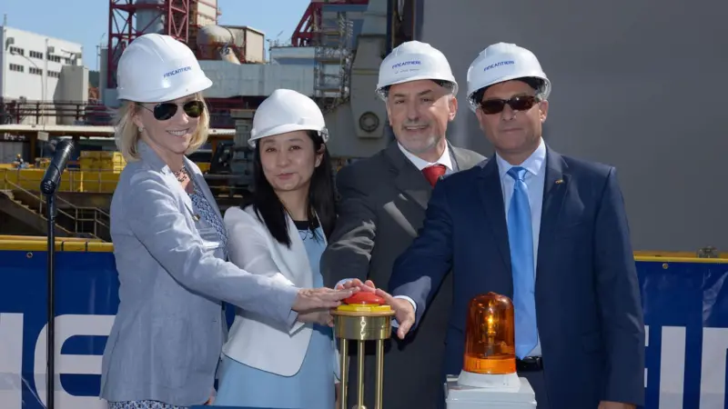 The keel laying ceremony was officiated by (l-r) Julie Benson, ex vice president of public relations for Princess Cruises; Cherry Wang, country director. Carnival China for Princess Cruises; Attilio Dapelo, director of the Fincanteri Monfalcone ...