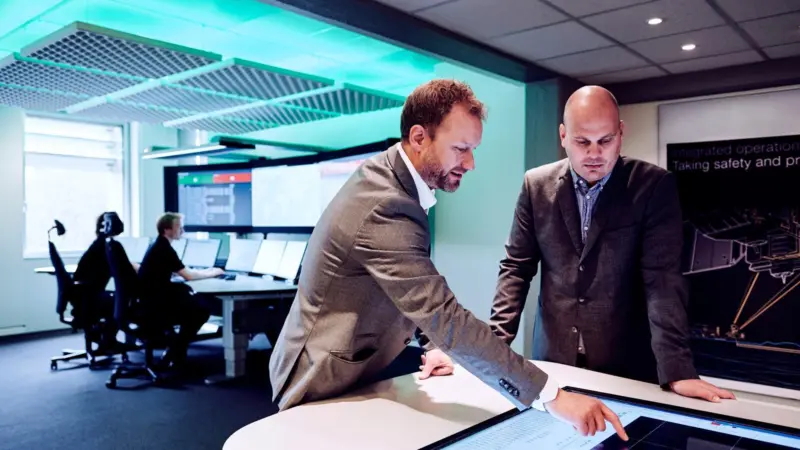 Andree Underthun, operations manager (left) and Stian Braastad, global technical support manager, at the new Integrated Operations Centre in Billingstad