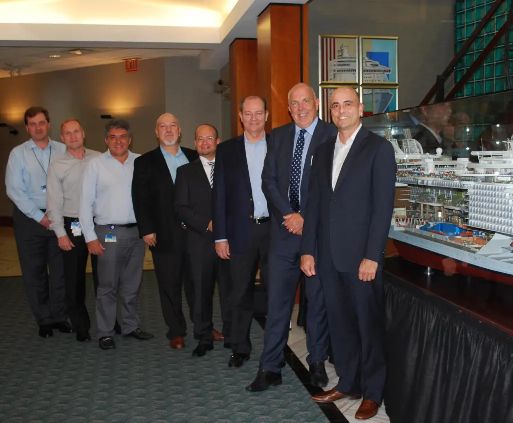 Right to left: Gregory M. Purdy (SVP, Marine Operations, Royal Caribbean International), Wayne Jones (SVP MAN PrimeServ), Carlos Pedercini (VP, Marine Operations & Global Nautical Services, Royal Caribbean International), Michael Kontny (Directo...