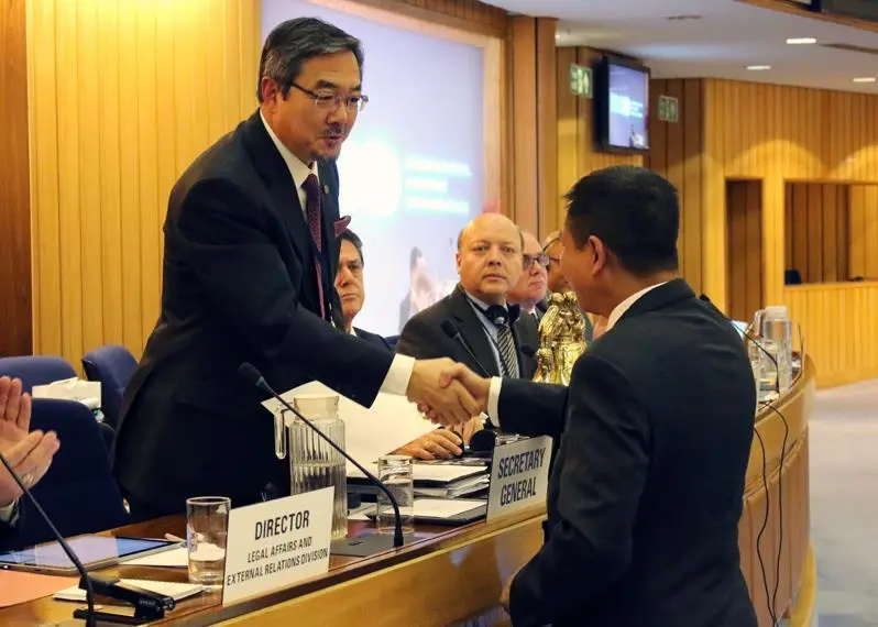 Indonesian minister of transportation Ignasius Jonan, deposited the instrument of acceptance with outgoing IMO secretary general Koji Sekimizu during the general assembly