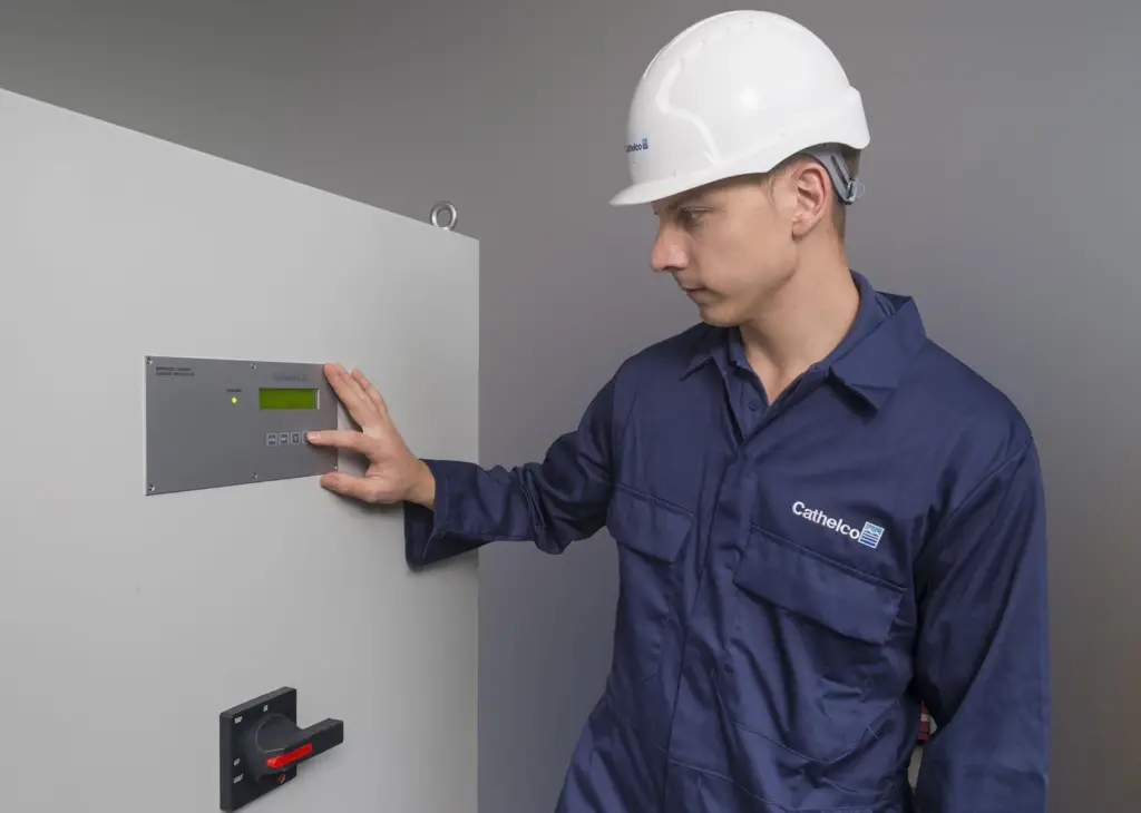 Cathelco engineer checking an ICCP control panel