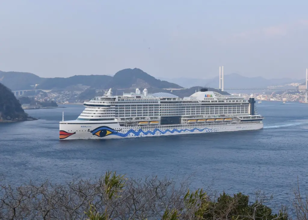 AIDAprima leaving Nagasaki for Hamburg, after delivery by Mitsubishi Heavy Industries