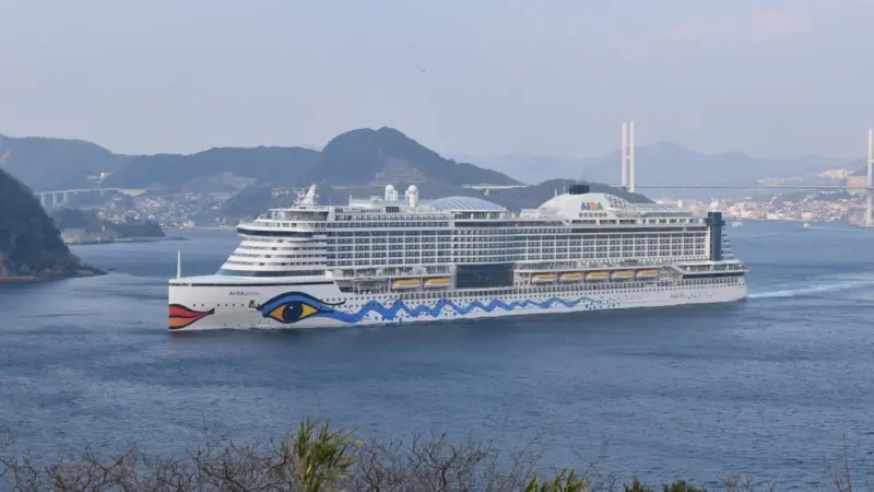 AIDAprima leaving Nagasaki for Hamburg, after delivery by Mitsubishi Heavy Industries