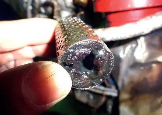 Inspection after the boiler explosion revealed waxy deposits in the unit's fuel line filter