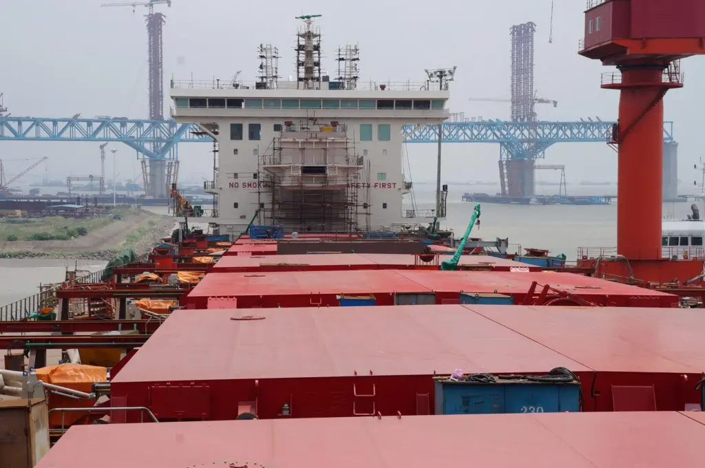 Looking aft over the MacRack side-rolling hatch covers before the installation of the 79m-long discharge boom
