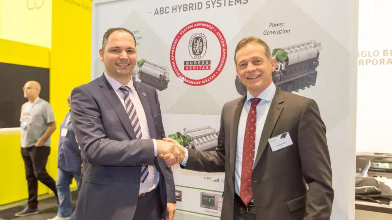Rik De Petter, marine & offshore chief executive, Bureau Veritas Belgium & Luxembourg (left) hands over approval and certification to Tim Berckmoes, CEO of Anglo Belgian Corporation