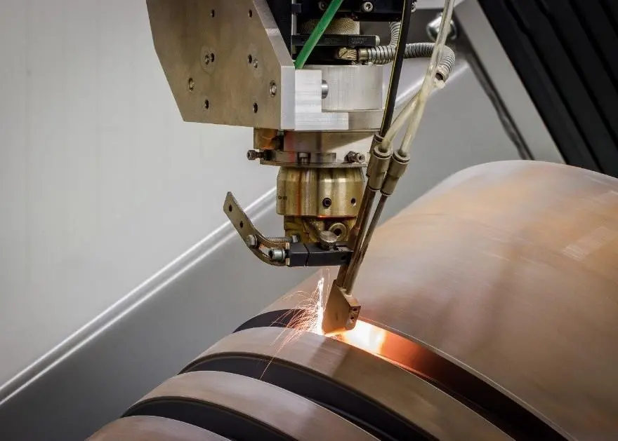 Robotised laser cladding can nearly double the lifetime of a two-stroke piston head, claims QuantiServ