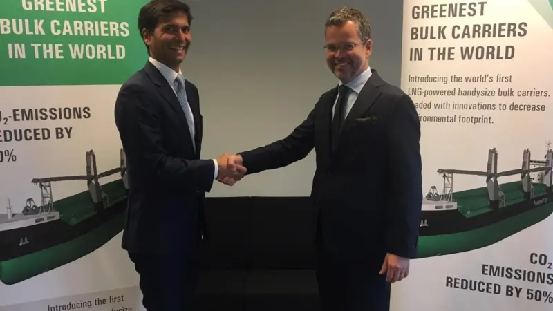 Mahinde Abeynaike (left) of Nauticor and Mikki Koskinen of ESL Shipping sign an LNG supply deal for ESL's gas-fuelled bulkers (credit: Nauticor)