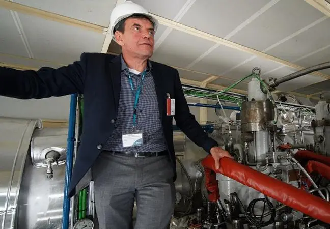 Nylund at WinGD's RTX-5 test engine in Trieste (credit: WinGD)