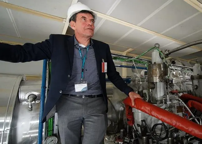 Nylund at WinGD's RTX-5 test engine in Trieste (credit: WinGD)