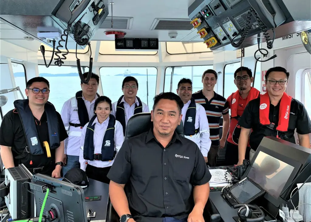 Participants from Wärtsilä, PSA Marine and MPA on board the IntelliTug during autonomous trials Photo: Wärtsilä