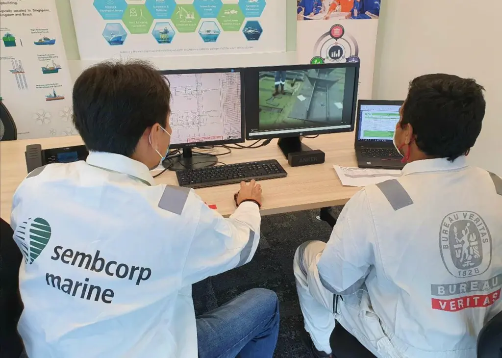 Sembcorp Marine Quality Control inspector working with helmet mounted camera and communication device Photo: BV