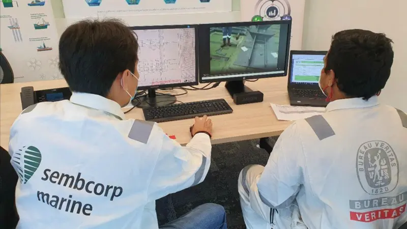 Sembcorp Marine Quality Control inspector working with helmet mounted camera and communication device Photo: BV
