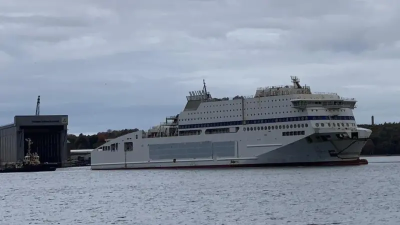 Unfinished Honfleur leaves FSG under tow for completion in Norway (Photo FSG)
