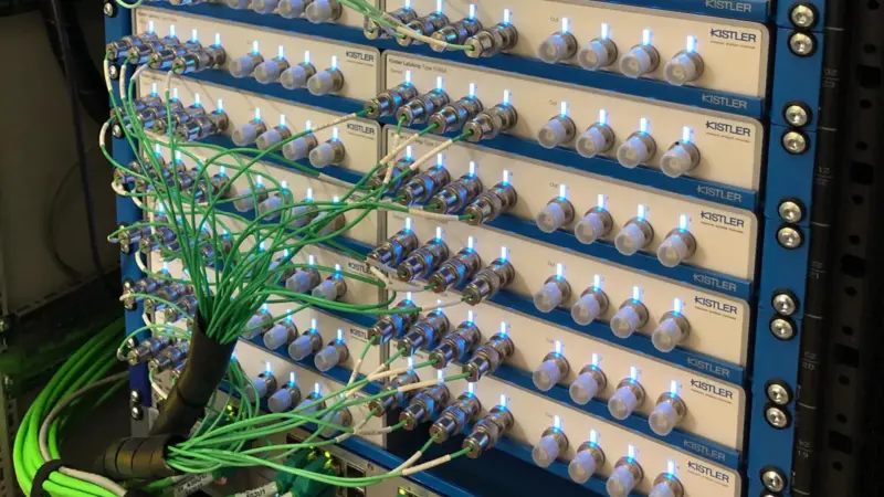 Accurately capturing wave impacts: signal processing and data acquisition for 100 pressure transducers are handled by 25 LabAmp charge amplifiers with automatic synchronization at 100 kHz. (credit: Kistler Group)