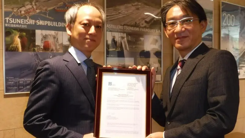 LR's Senior Inspector Hideo Natsui (left) presented the AiP to Tsuneishi Shipbuilding's Shipbuilding Sales Department Manager Keiichiro Sho (right) on 30 March.